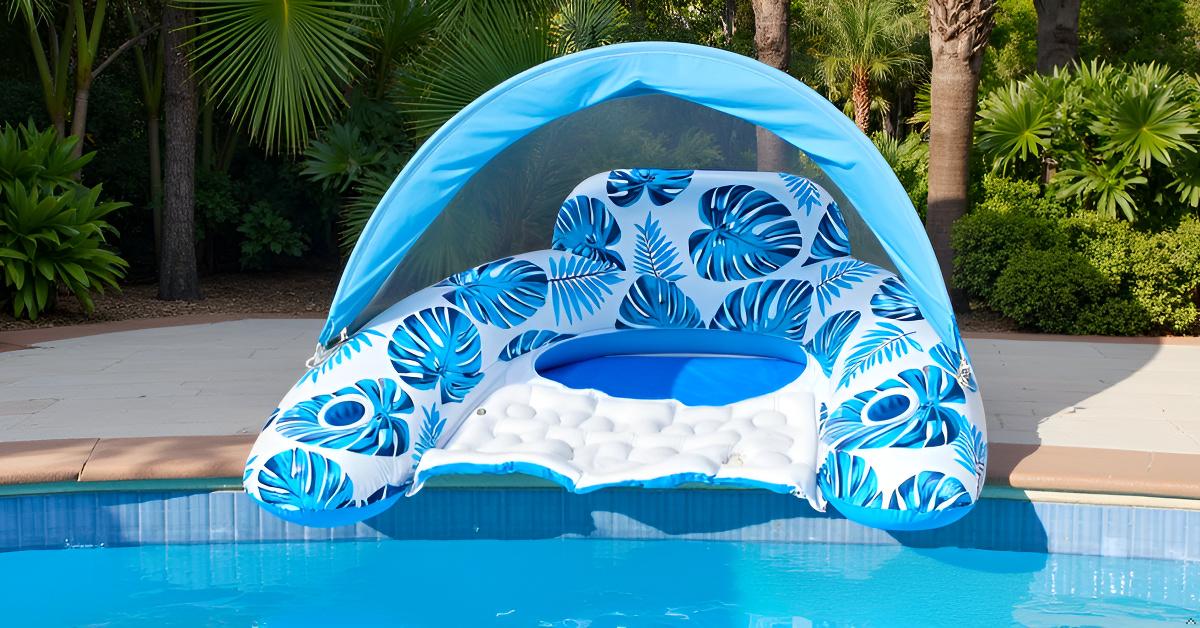 Inflatable float canopy by the pool tropical trees in the background vibrant noon sun